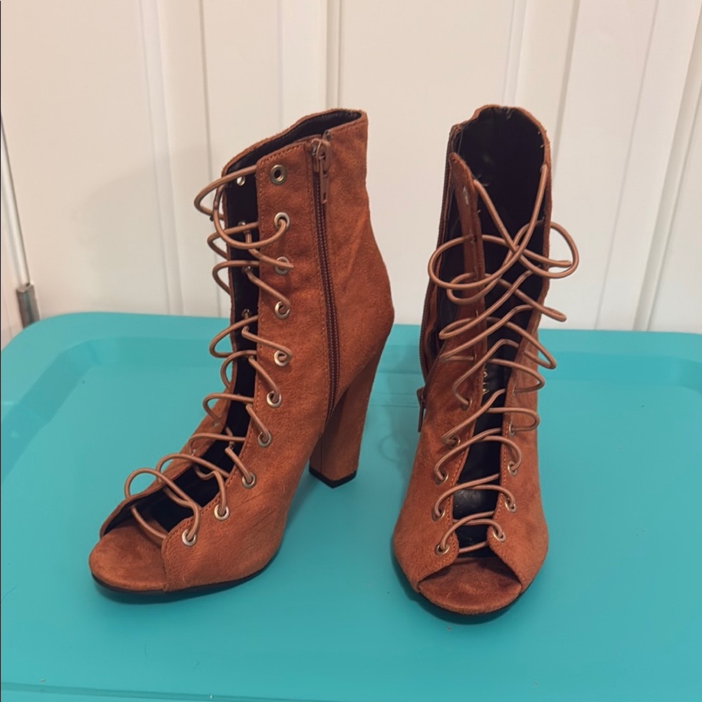 Brown Lace-Up Boots with Vintage Charm